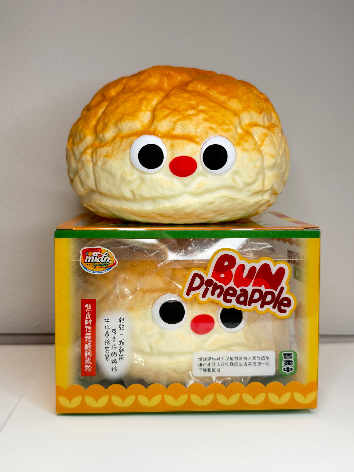 Mido Red Nose Pineapple Bun Squishy